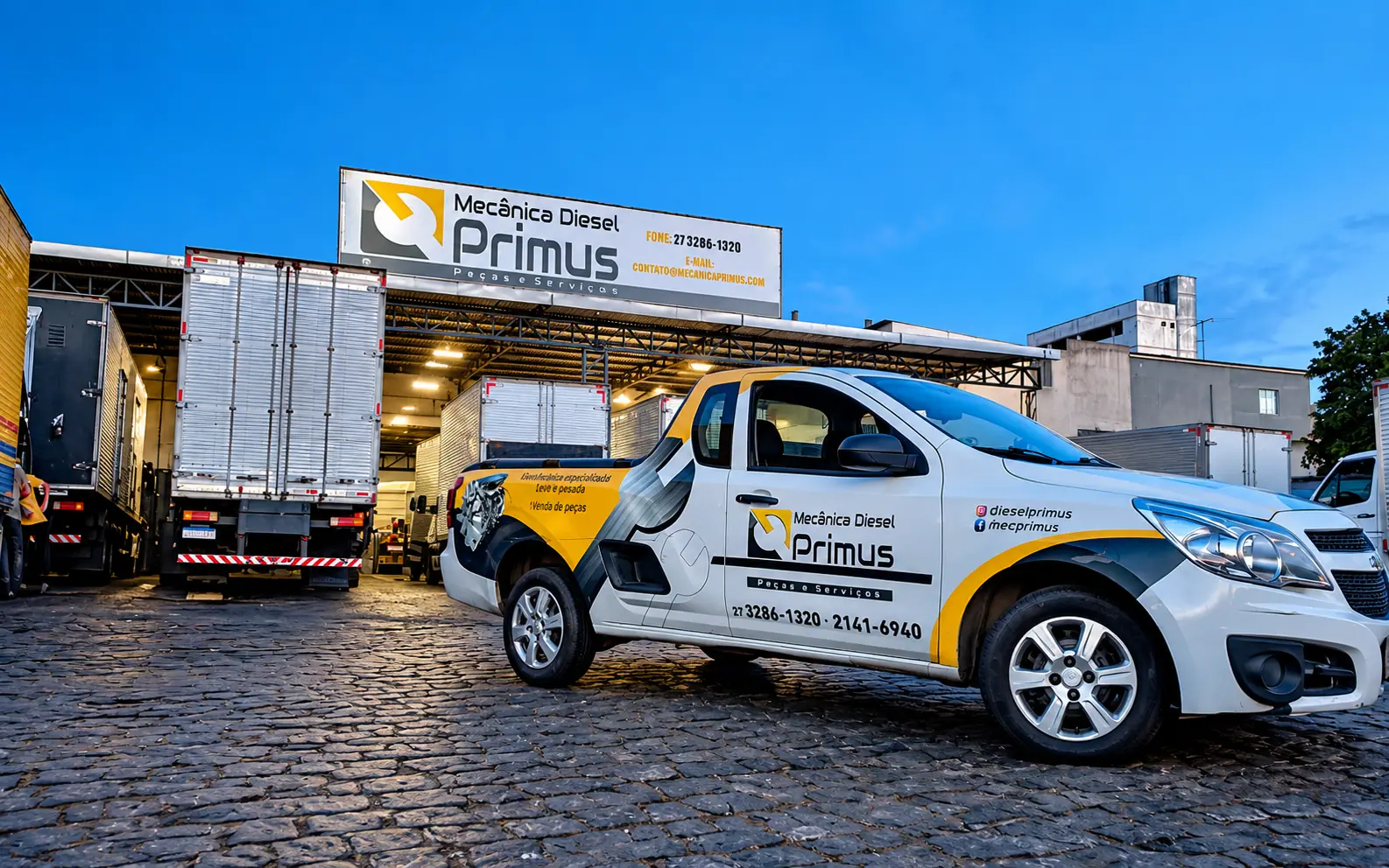 Fachada da Mecânica Diesel Primus com veículos de atendimento
